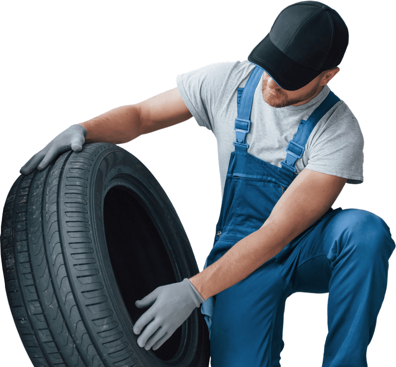 Auto-Mechanists-Holding-Tire